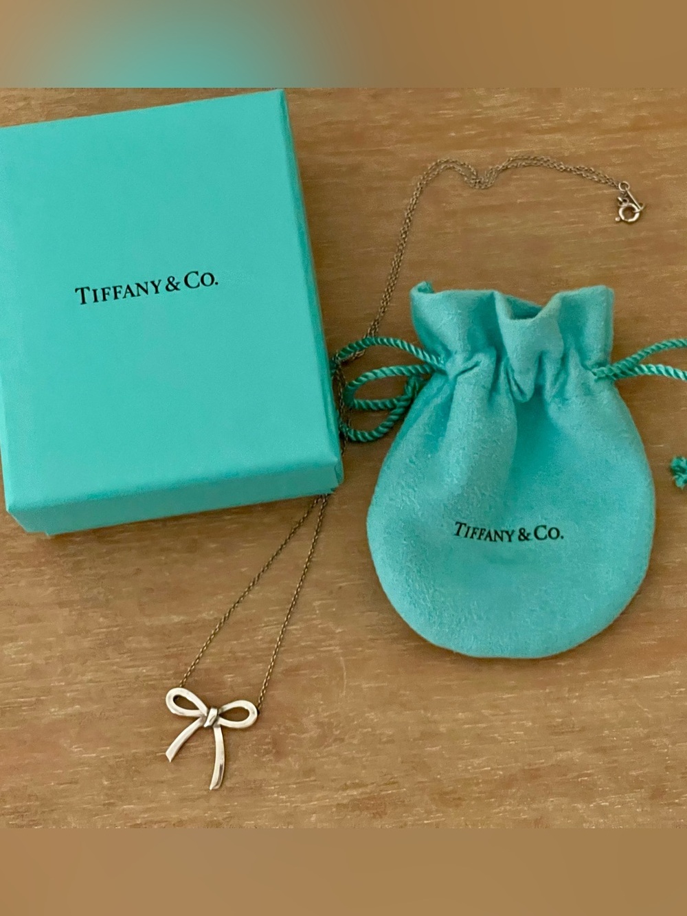 Tiffany & Co. Gold Bow Pendant Necklace with Tiffany Blue Pouch